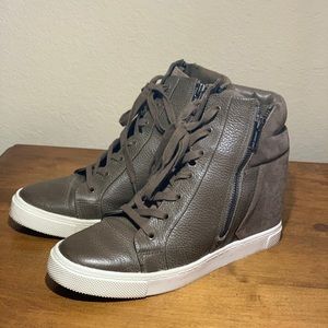 Olive color sneakers with heal inside